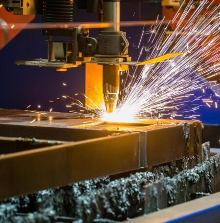 closeup-shot-sparks-flying-from-industrial-steel-cutter_181624-60300