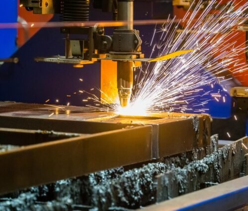 closeup-shot-sparks-flying-from-industrial-steel-cutter_181624-60300